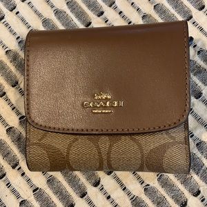 Coach trifold wallet signature canvas